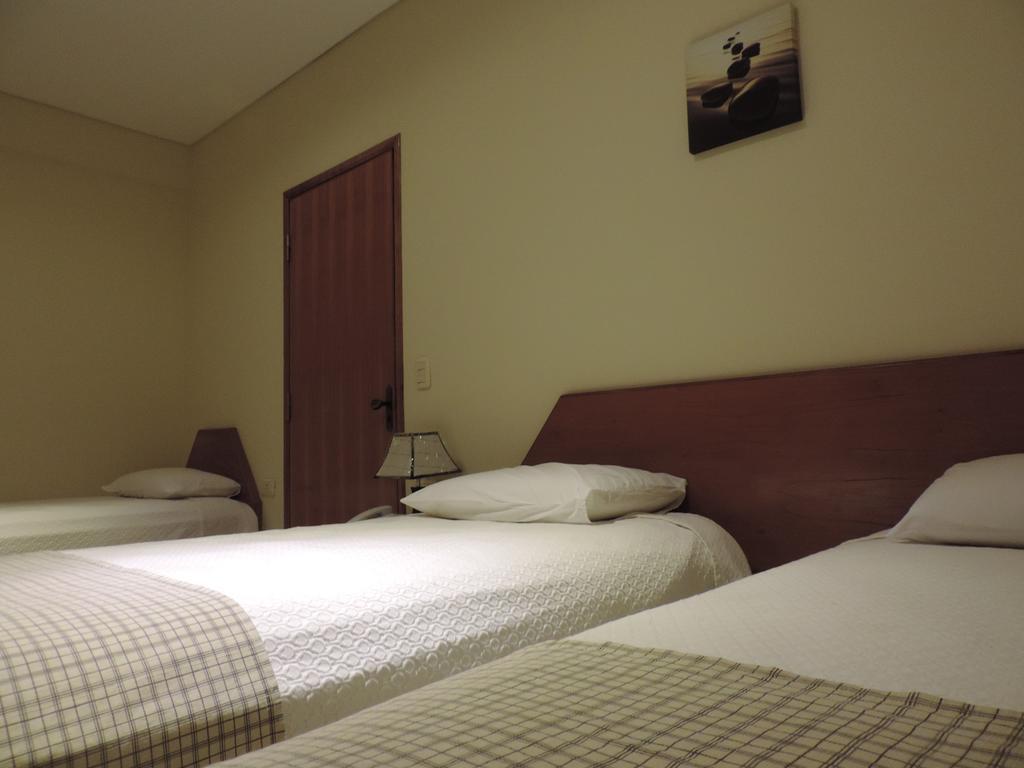 Hotel Domingo Savio Encarnación Quarto foto